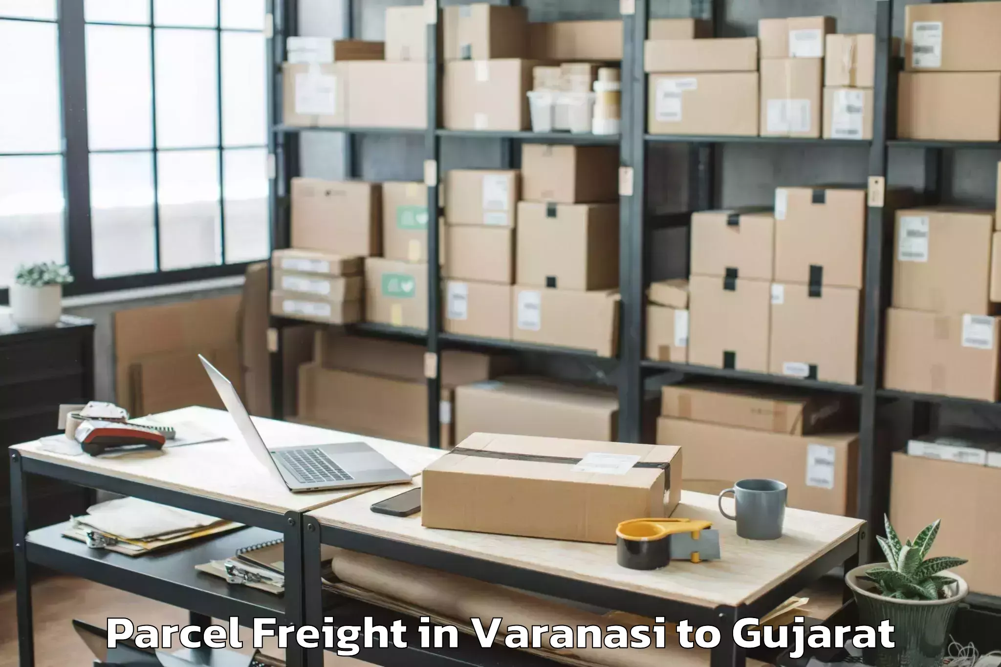 Varanasi to Becharaji Parcel Freight Booking